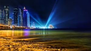 Qatar, Cityscape, City lights, Night time, Light beam, Skyscrapers, Body of Water, Beach, Long exposure, 4K wallpaper