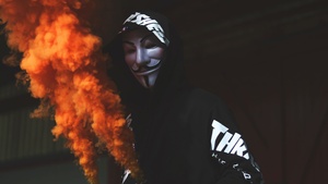 Guy Fawkes mask, Man in Mask, Black Hoodie, Orange Smoke, Dark background, Anonymous, 4K wallpaper