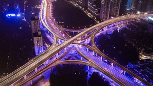 Roads, Intersection, Cityscape, Aerial view, Night time, City lights, Purple light, Bridge, Skyscrapers, 4K wallpaper