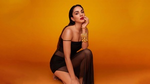 Kiara Advani, Black dress, Orange background, Indian actress, 4K wallpaper