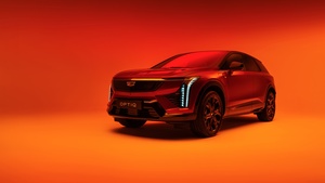 Cadillac Optiq, 2025, Electric SUV, Orange background, 4K wallpaper